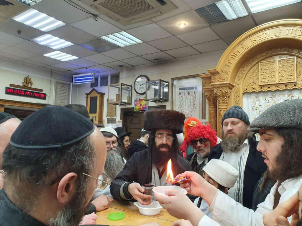 פורים תשפ"ד באומן: קריאת המגילה בציון רבי נחמן