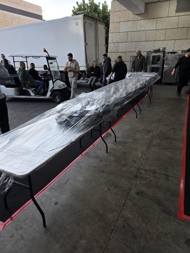 גלריה מיוחדת: בגני התערוכה נערכים לאירוע היהודי הגדול בעולם