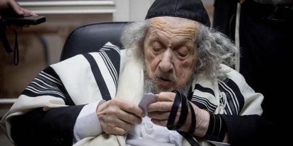 a man in a black and white robe