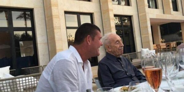 פאקר עם שמעון פרס \ צילום: דוברות בתי המשפט